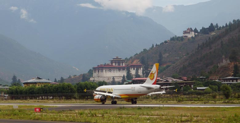 Take a Photo of Paro Dzong from Paro Airport